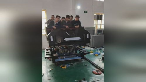 軌道影院生產工廠內師傅們做出廠測試,專業師傅一臉嚴肅一臉享受